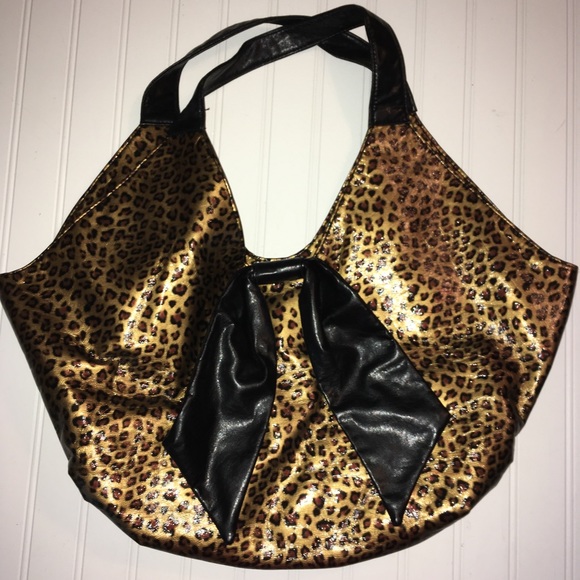 Stone & Co. Handbags - Stone & Co animal print bag black straps large bow